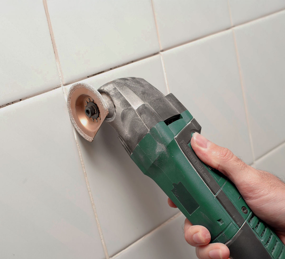 oscillating-tool-grout-removal An Oscillating tool with diamond grout removal blade.