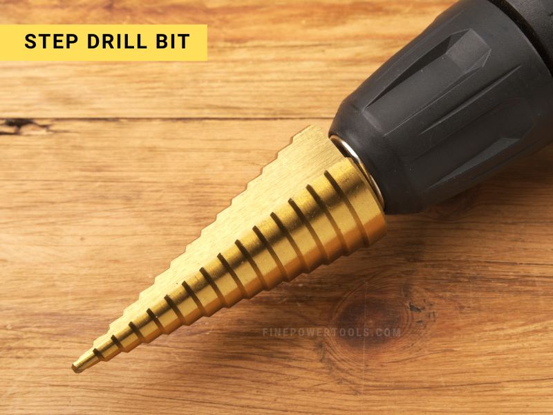A Step Drill Bit Close-up of a Step Drill Bit on a cordless drill chuck