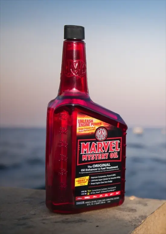A bottle of Marvel Mystery Oil near sea shore
