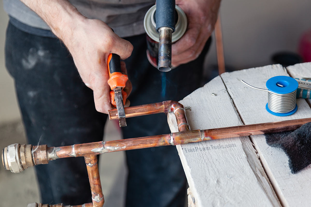 Butane torch used for soldering copper pipes
