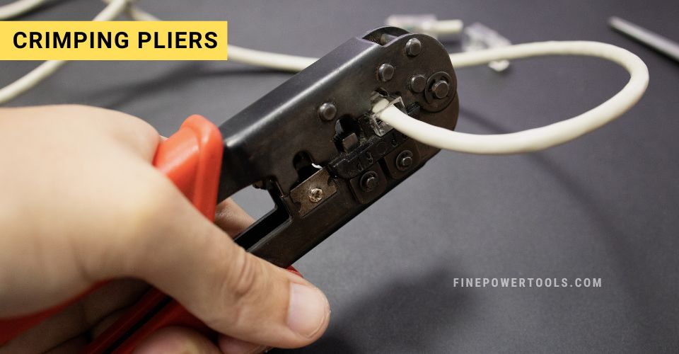 Using crimping pliers on data cable.