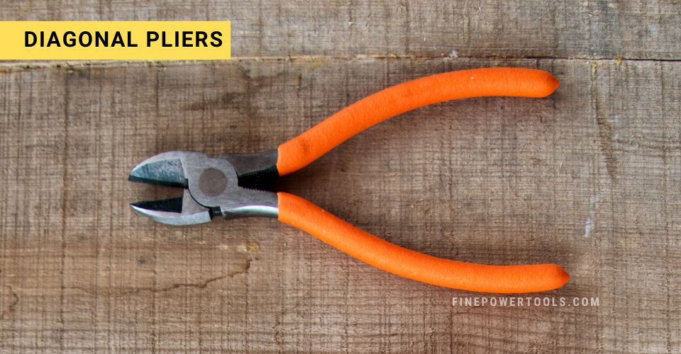 Diagonal cutting pliers (side cutters) on a wooden bench,