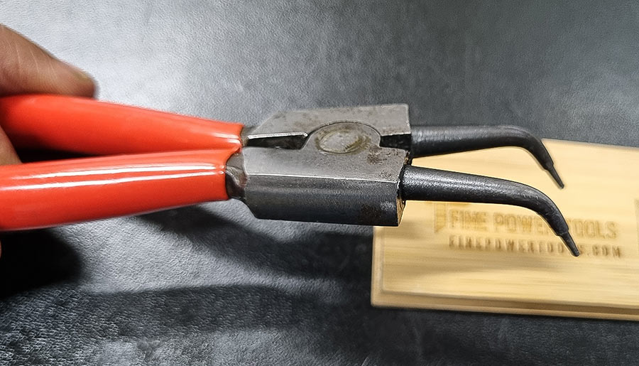 Snap Ring Pliers on black background