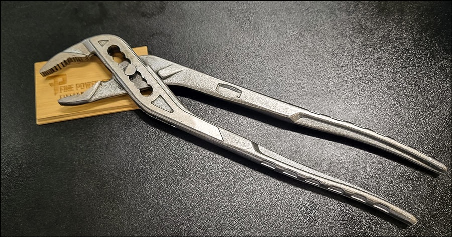 Tongue-and-Groove Pliers on black background.
