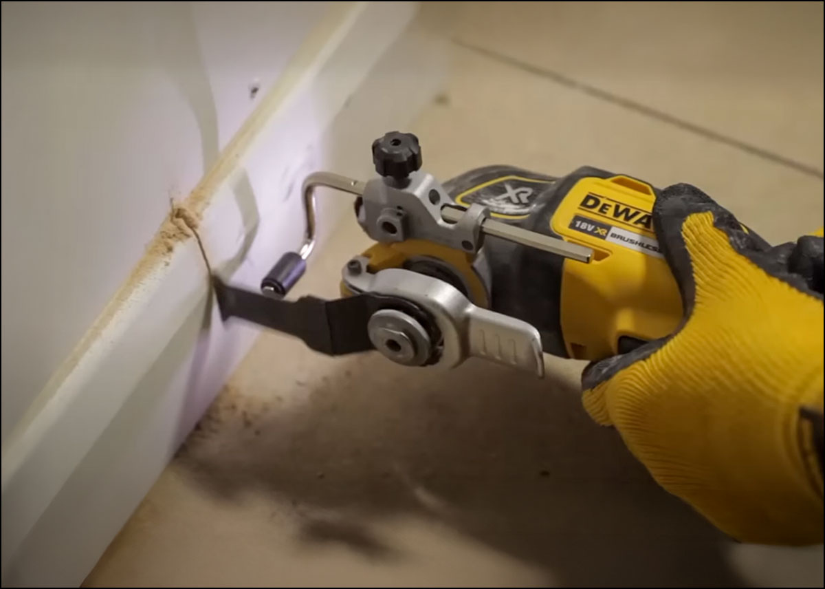 DeWalt Oscillating Tool - Click Here Man using DeWalt oscillating multi tool