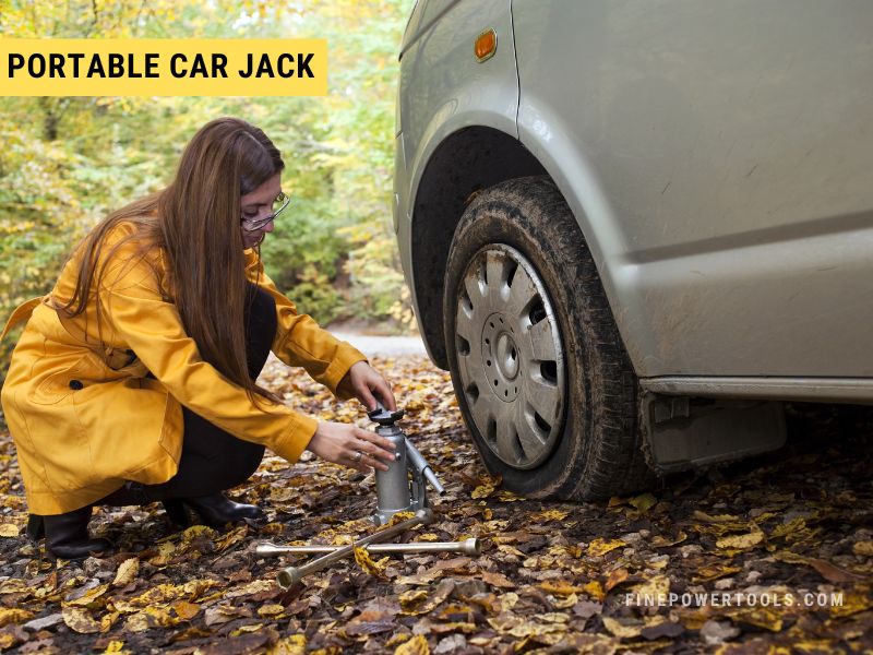 Woman using portable car jack