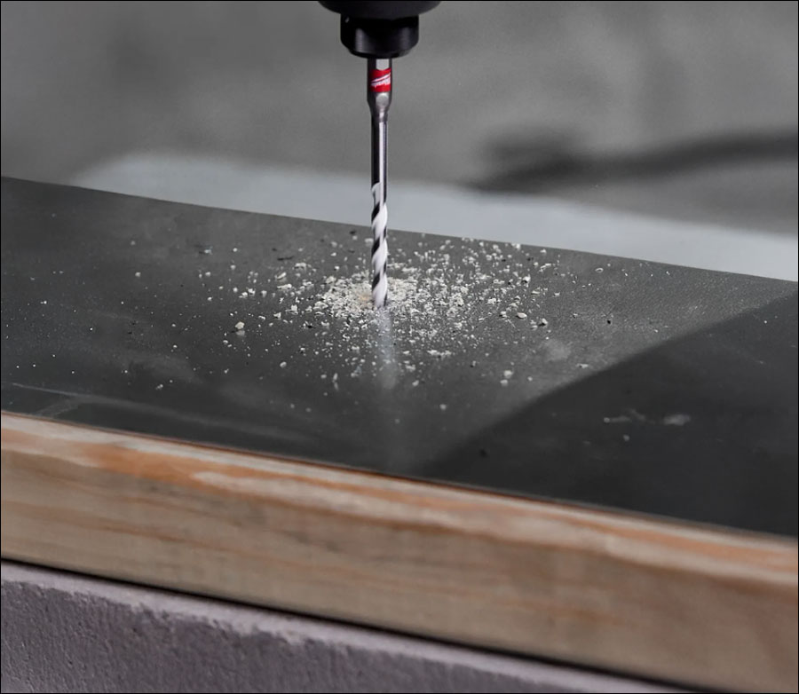 Multi-Material Drill Bit A Multi-Material Drill Bit drilling metal and wood.