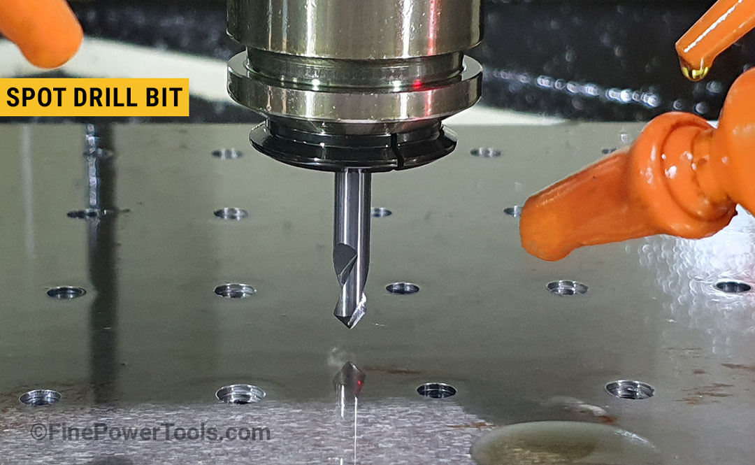 spot-drill-bit A spot drill bit drilling in steel plate