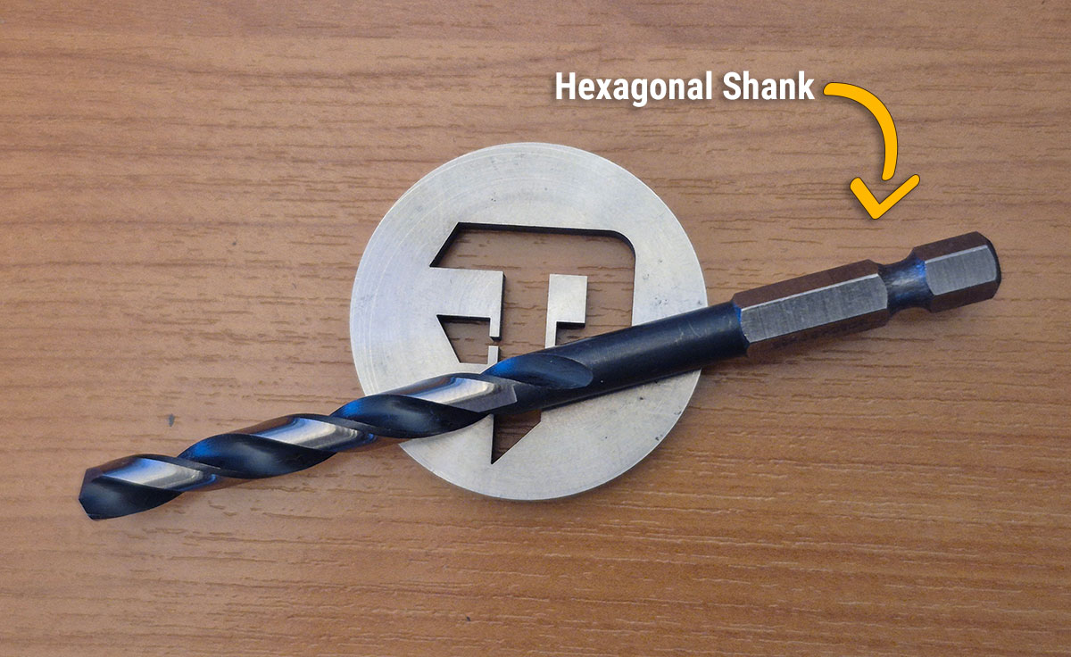 Hex Shank Drill Bit A hexagonal shank drill bit placed on Finepowertools logo