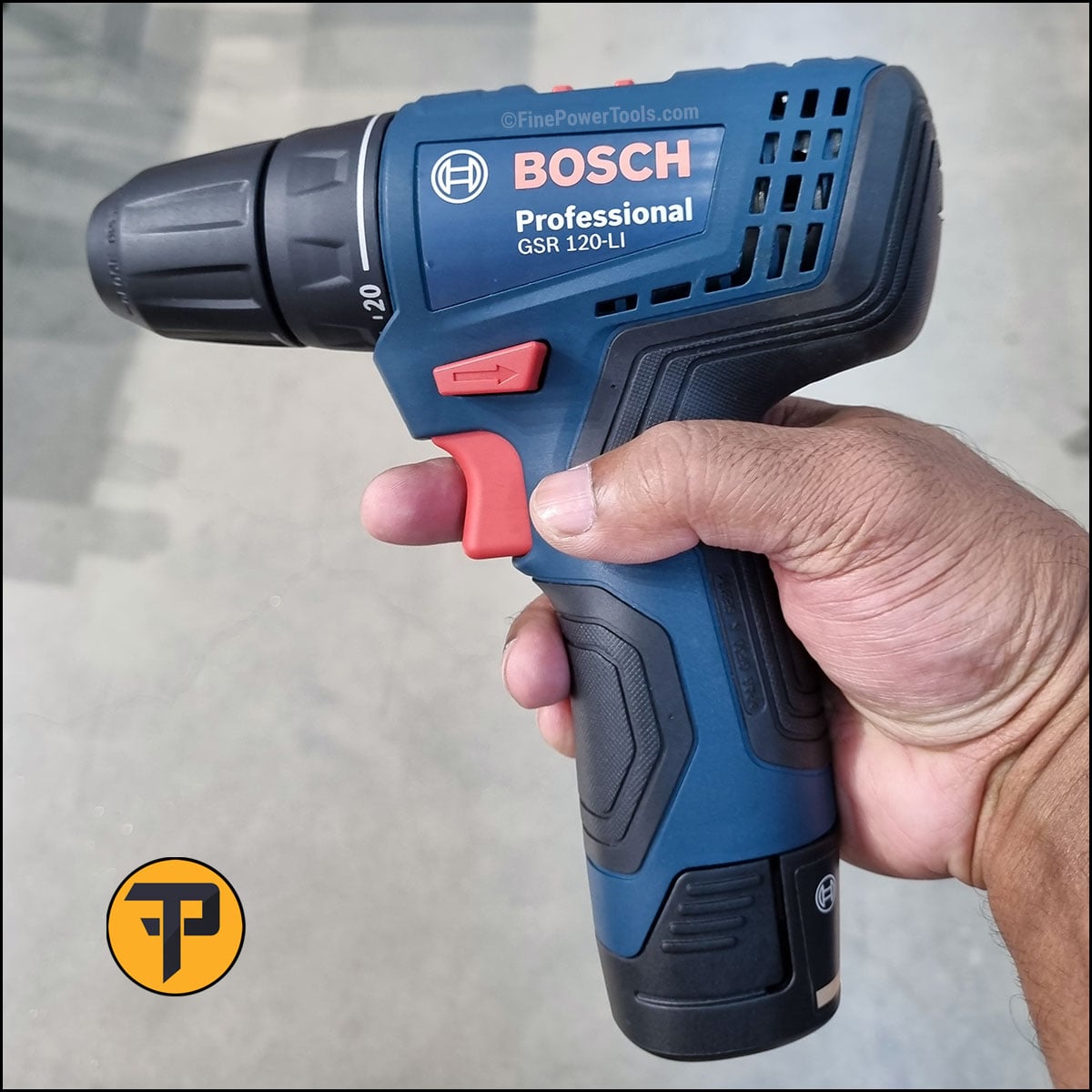 bosch cordless drill-driver Dan Miller holding a Bosch cordless drill driver in his hand.